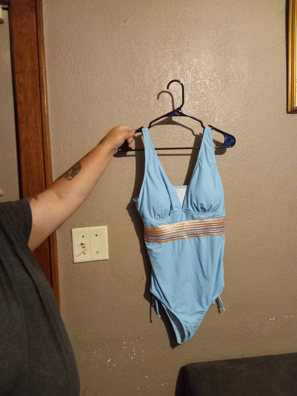 Light Blue One-Piece Swimsuit with Decorative Waistband